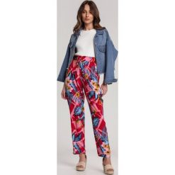 Czerwone Spodnie Petinassa. Czerwone spodnie damskie Renee, xl, z tkaniny. W wyprzedaży za 44,99 zł.
