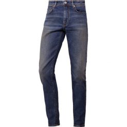 J.LINDEBERG DAMIEN BOWL Jeans Skinny Fit mid blue. Niebieskie jeansy męskie marki J.LINDEBERG, m, bez wzorów. Za 569,00 zł.