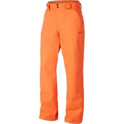 Oakley Spodnie Snowboardowe Sun King 10k Bzs Pants Neon Orange Xl. Pomarańczowe spodnie męskie Oakley, s, bez wzorów, ze skóry, sportowe. W wyprzedaży za 401,00 zł.