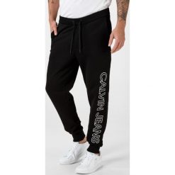 Calvin Klein Spodnie dresowe Czarny. Czarne spodnie męskie Calvin Klein, m, bez wzorów, z bawełny. Za 393,95 zł.