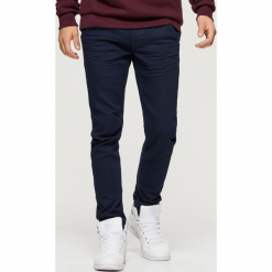 Jeansy SLIM JOGGER - Niebieski. Niebieskie jeansy męskie regular Cropp. Za 119,99 zł.