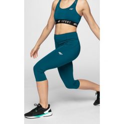 Legginsy treningowe damskie SPDF303 - morska zieleń. Żółte legginsy damskie 4f, s, bez wzorów, z materiału. Za 99,99 zł.