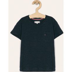 Tommy Hilfiger - T-shirt dziecięcy 98-176 cm. Niebieskie bluzki dziewczęce TOMMY HILFIGER, bez wzorów, z bawełny, z okrągłym kołnierzem, z krótkim rękawem, krótkie, bez kaptura. W wyprzedaży za 99,90 zł.