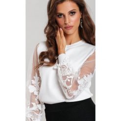 Biała Bluzka Phatter. Białe bluzki damskie Renee, s, z aplikacjami, z dzianiny, eleganckie, z okrągłym kołnierzem, bez rękawów. Za 109,99 zł.