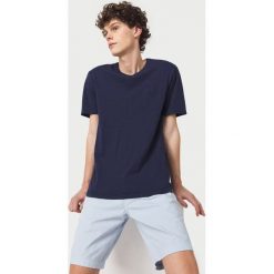 O'Neill Essentials Koszulka Niebieski. Niebieskie podkoszulki męskie O'Neill, s, bez wzorów, z bawełny, bez kołnierzyka, z krótkim rękawem, krótkie. Za 102,95 zł.