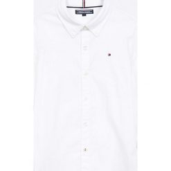 Tommy Hilfiger - Koszula dziecięca 122-176 cm. Białe koszule męskie TOMMY HILFIGER, z elastanu, z klasycznym kołnierzykiem, z długim rękawem. Za 279,90 zł.
