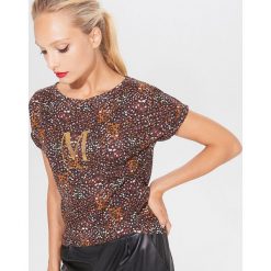 Bawełniana koszulka z motywem animal print - Brązowy. Pomarańczowe koszulki damskie Mohito, s, bez wzorów, z bawełny, bez kołnierzyka, bez rękawów. W wyprzedaży za 29,99 zł.