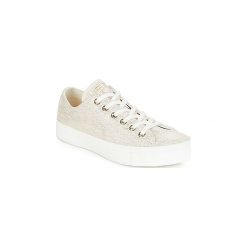 Buty Converse CHUCK TAYLOR ALL STAR OX. Białe trampki i tenisówki damskie marki Converse, bez wzorów, bez zapięcia. Za 303,20 zł.