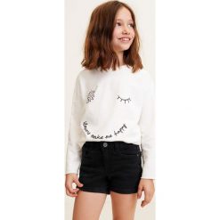 Mango Kids - Szorty dziecięce Patri 104-164 cm. Szare spodenki dziewczęce marki Mango Kids, z aplikacjami, z elastanu, casualowe. Za 69,90 zł.