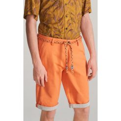 Bawełniane szorty - Pomarańczowy. Pomarańczowe spodenki i szorty męskie Reserved, m, bez wzorów, z bawełny. Za 59,99 zł.