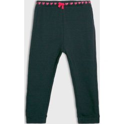Blukids - Spodnie dziecięce 68-98 cm. Niebieskie spodnie dziewczęce Blukids, bez wzorów, z elastanu, casualowe. Za 49,90 zł.