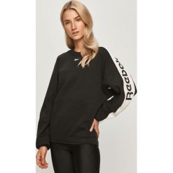 Reebok - Bluza. Czarne bluzy damskie Reebok, s, z nadrukiem, z elastanu, z długim rękawem, długie, bez kaptura. Za 199,90 zł.