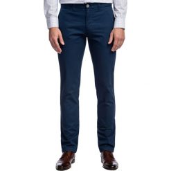 Spodnie STEFANO SMGS030160. Spodnie męskie Giacomo Conti, na lato, m, bez wzorów, z elastanu. Za 199,00 zł.