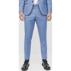 Spodnie garniturowe slim fit -. Spodnie garniturowe męskie Reserved, bez wzorów. Za 169,99 zł.