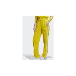 Spodnie treningowe adidas Firebird Track Pants. Żółte spodnie damskie Adidas. Za 199,00 zł.