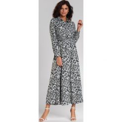 Szara Sukienka Humera. Szare sukienki damskie Renee, s, bez wzorów, z tkaniny, eleganckie, z klasycznym kołnierzykiem, z długim rękawem, długie, maxi, rozkloszowane. Za 129,99 zł.