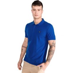 Calvin Klein Polo Koszulka Niebieski. Niebieskie podkoszulki męskie Calvin Klein, l, bez wzorów, z bawełny, bez rękawów. Za 292,95 zł.