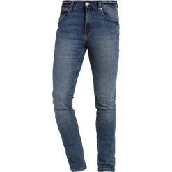 Cheap Monday TIGHT Jeans Skinny Fit indigo head. Niebieskie jeansy męskie relaxed fit marki Cheap Monday. W wyprzedaży za 174,30 zł.