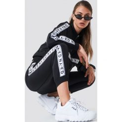 NA-KD Spodnie sportowe - Black. Czarne spodnie sportowe damskie marki NA-KD. Za 161,95 zł.