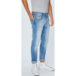 Tommy Jeans - Jeansy Modern Tapered. Niebieskie jeansy męskie marki Tommy Jeans. W wyprzedaży za 399,90 zł.