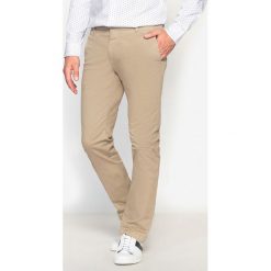 Spodnie chino slim. Brązowe chinosy męskie marki La Redoute Collections, z bawełny. Za 141,08 zł.