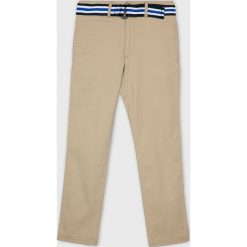 Polo Ralph Lauren - Spodnie dziecięce 134-158 cm. Brązowe spodnie chłopięce Polo Ralph Lauren, w paski, z elastanu. W wyprzedaży za 219,90 zł.