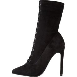 Steve Madden SATISFIED Botki na obcasie black. Czarne botki damskie na obcasie marki Steve Madden, z materiału. Za 589,00 zł.