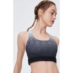 Sportowy top - Czarny. Czarne topy damskie Sinsay, s, bez wzorów, bez rękawów. Za 29,99 zł.