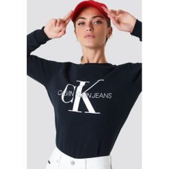 Calvin Klein Bluza Core Monogram Logo - Black. Czarne bluzy damskie marki Calvin Klein, bez wzorów, bez rękawów, bez kaptura. Za 404,95 zł.
