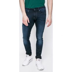 G-Star Raw - Jeansy Revend. Niebieskie jeansy męskie G-Star RAW, bez wzorów, retro. W wyprzedaży za 379,90 zł.