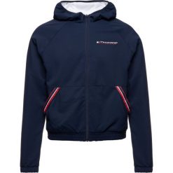 Kurtka przejściowa Tommy Sport S10S100278. Niebieskie kurtki sportowe damskie Tommy Sport, s, bez wzorów, z poliesteru, bez kaptura. W wyprzedaży za 329,00 zł.