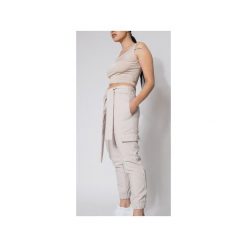 Spodnie typu cargo nude. Brązowe spodnie damskie Rest_factory, xl, bez wzorów, z satyny, z podwyższonym stanem. Za 219,00 zł.