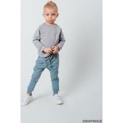 Spodenki T w i n e PANTS niebieski. Niebieskie bluzy chłopięce marki Pakamera, z aplikacjami. Za 105,00 zł.