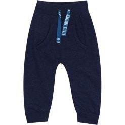 TXM spodnie niemowlęce 80 NIEBIESKI. Niebieskie spodnie niemowlęce TXM, bez wzorów. Za 19,99 zł.