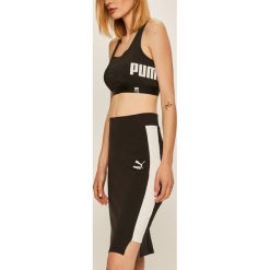 Puma - Spódnica. Czarne spódniczki damskie Puma, na co dzień, s, z aplikacjami, z elastanu, casualowe, z podwyższonym stanem, mini, ołówkowe. Za 199,90 zł.
