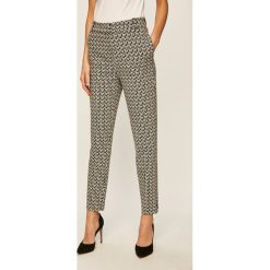 Tommy Hilfiger - Spodnie. Czarne spodnie damskie TOMMY HILFIGER, z haftami, z elastanu. W wyprzedaży za 429,90 zł.