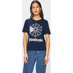 Reebok Classic - Top. Niebieskie topy damskie Reebok Classic, s, z nadrukiem, z elastanu, z okrągłym kołnierzem. W wyprzedaży za 79,90 zł.