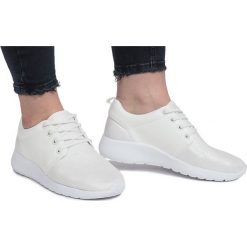 Białe Biały sportowe trampki Renée. Białe trampki i tenisówki damskie ButyModne, bez wzorów, ze skóry, na sznurówki. Za 69,00 zł.