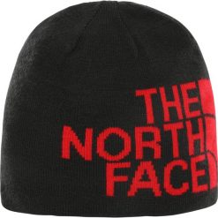 Dwustronna czapka The North Face beanie z banerem T0AKNDHX9. Czerwone czapki damskie The North Face, bez wzorów. Za 77,99 zł.