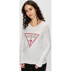 Guess Jeans - Bluzka. Białe bluzki damskie marki Guess Jeans, s, z nadrukiem, z bawełny, casualowe, z okrągłym kołnierzem. Za 169,90 zł.