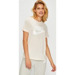 Nike Sportswear - Top. Różowe topy damskie Nike Sportswear, s, z nadrukiem, z poliesteru, z okrągłym kołnierzem. W wyprzedaży za 99,90 zł.