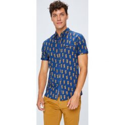 Medicine - Koszula Monumental. Niebieskie koszule męskie marki MEDICINE, xl, z elastanu, klasyczne, z klasycznym kołnierzykiem, z krótkim rękawem. W wyprzedaży za 39,90 zł.