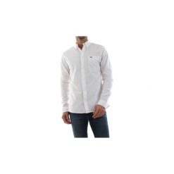 Koszule z długim rękawem Tommy Jeans DM0DM04484 TJM CLASSIC. Białe koszule męskie Tommy Jeans, s, bez wzorów, z jeansu, bez kołnierzyka, z długim rękawem. Za 248,38 zł.