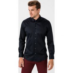 Giorgio Armani Koszula Niebieski. Niebieskie koszule męskie Giorgio Armani, bez wzorów, z bawełny, bez kołnierzyka, z długim rękawem. Za 1611,95 zł.