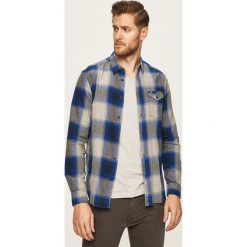 Wrangler - Koszula. Niebieskie koszule męskie Wrangler, s, bez wzorów, z bawełny, klasyczne, z klasycznym kołnierzykiem, z długim rękawem. W wyprzedaży za 169,90 zł.