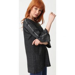 Czarny Sweter Fireside. Czarne swetry damskie Born2be, s, z aplikacjami, z dzianiny, klasyczne, bez rękawów, bez kaptura. Za 109,99 zł.