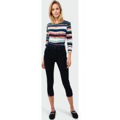Jeansowe spodnie 7/8. Spodnie damskie Greenpoint, z elastanu. Za 59,99 zł.