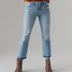 Jeansy bootcut z przetarciami - Niebieski. Niebieskie jeansy damskie Mohito. W wyprzedaży za 39,99 zł.