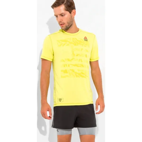 Reebok Koszulka Ss Rcf Burnout Solid , żółty, rozmiar M. Żółte koszulki męskie Reebok, m, bez wzorów, z poliesteru, bez kołnierzyka, bez rękawów. W wyprzedaży za 119,99 zł.