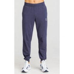 SPODNIE DRESOWE EA7 EMPORIO ARMANI. Niebieskie spodnie męskie m, z nadrukiem, z bawełny. Za 257,40 zł.